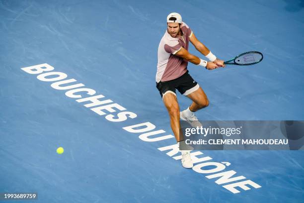 Russia's Karen Khachanov returns the ball to Russia's Karen Khachanov during their men's semi-final singles tennis match at the ATP Open 13 in...