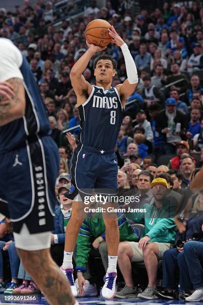 Josh Green of the Dallas Mavericks three point basket during the game against the Oklahoma City Thunder on February 10, 2024 at the American Airlines...