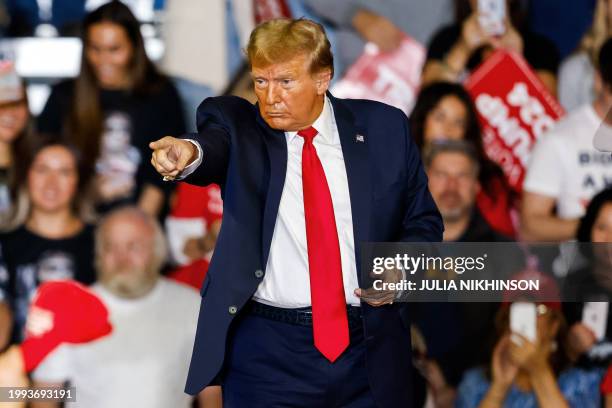 Former US President and 2024 presidential hopeful Donald Trump attends a "Get Out the Vote" Rally in Conway, South Carolina, on February 10, 2024. /...