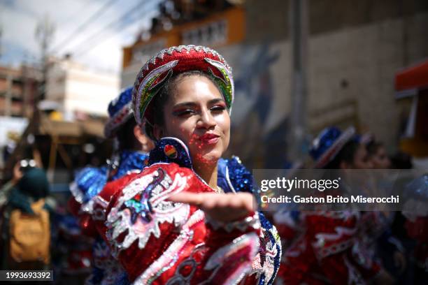 Woman wearing traditional clothes dances Caporales during the 2024 Oruro Carnval on February 10, 2024 in Oruro, Bolivia. Listed as one of the...