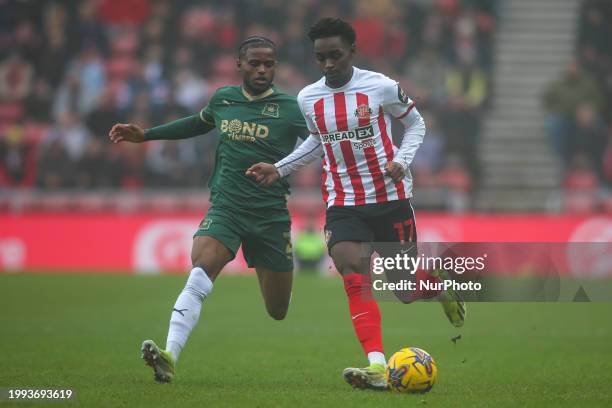 Sunderland's Abdoullah Ba takes on Plymouth Argyle's Bali Mumba during the Sky Bet Championship match between Sunderland and Plymouth Argyle at the...