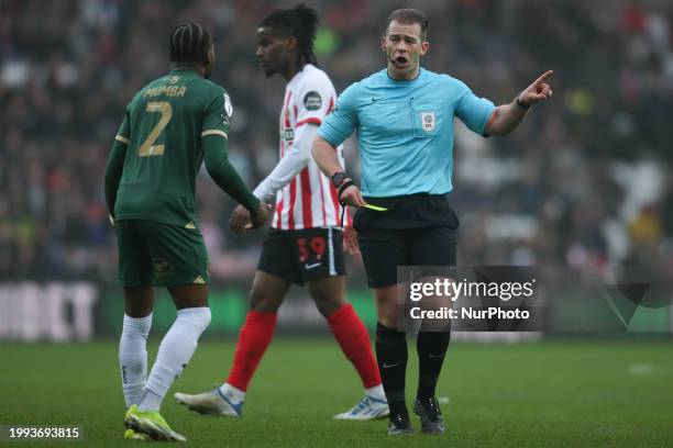 Plymouth Argyle's Bali Mumba is shown a yellow card during the Sky Bet Championship match between Sunderland and Plymouth Argyle at the Stadium Of...