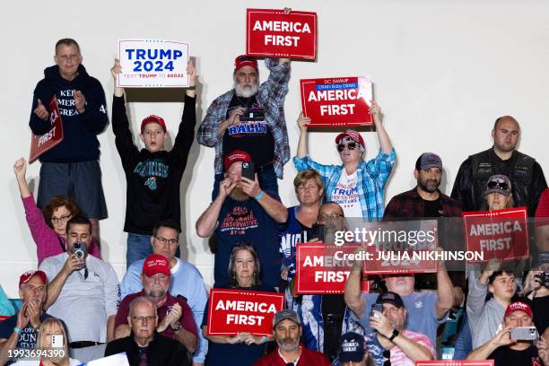 People attend a "Get Out the Vote" Rally for former US President and 2024 presidential hopeful Donald Trump in Conway, South Carolina, on February...
