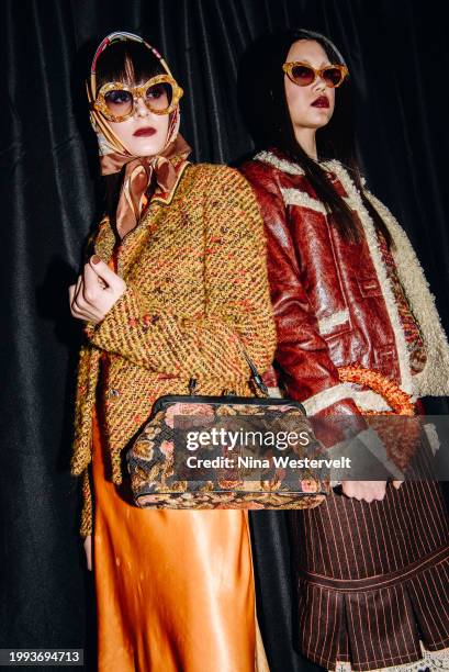 Models pose backstage at Anna Sui RTW Fall 2024 as part of New York Ready to Wear Fashion Week held at the Strand Book Store on February 10, 2024 in...