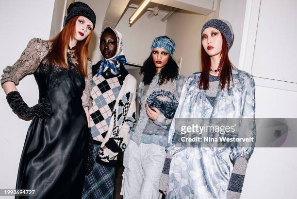 Models pose backstage at Anna Sui RTW Fall 2024 as part of New York Ready to Wear Fashion Week held at the Strand Book Store on February 10, 2024 in...