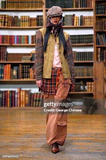 Model on the runway at Anna Sui RTW Fall 2024 as part of New York Ready to Wear Fashion Week held at the Strand Book Store on February 10, 2024 in...