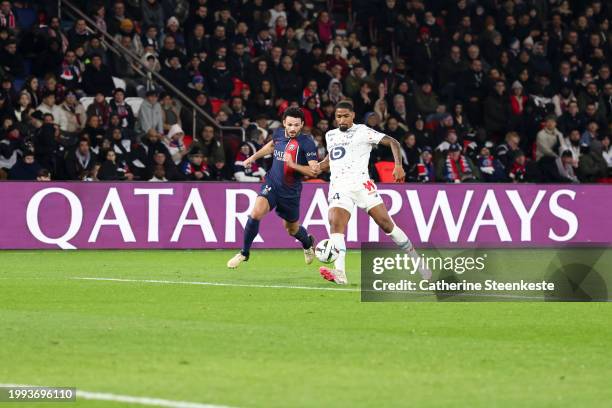 Gonçalo Ramos of Paris Saint-Germain challenges Alexsandro Victor De Souza Ribeiro of Lille OSC during the Ligue 1 Uber Eats match between Paris...