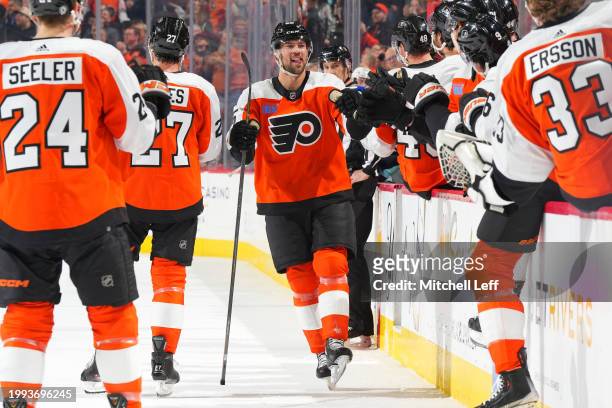 Ryan Poehling of the Philadelphia Flyers celebrates with teammates after scoring a goal against the Seattle Kraken in the first period at the Wells...