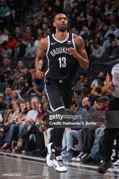 Keita Bates-Diop of the Brooklyn Nets looks on during the game against the San Antonio Spurs on February 10, 2024 at Barclays Center in Brooklyn, New...