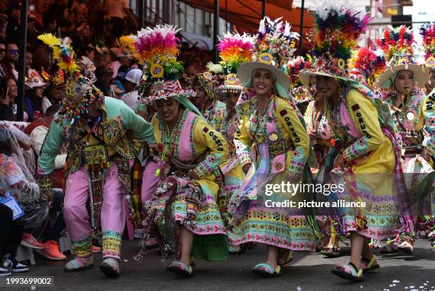 February 2024, Bolivia, Oruro: Dancers from the group "Tinkus" perform during the Oruro Carnival in Oruro. The festival with folk dances, costumes...