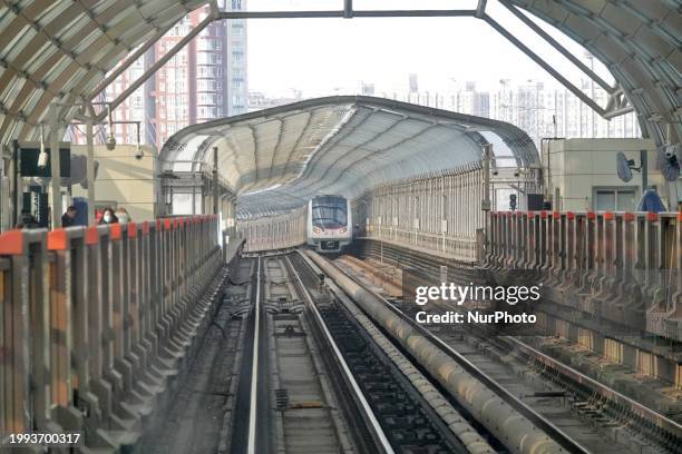 Subway train is running on Line 5 in Beijing, China, on February 6, 2024.