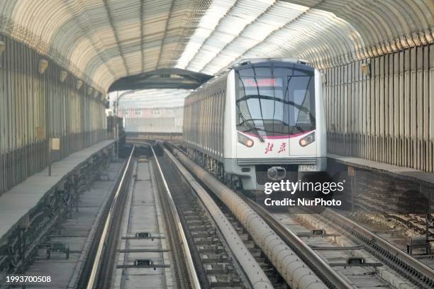 Subway train is running on Line 5 in Beijing, China, on February 6, 2024.