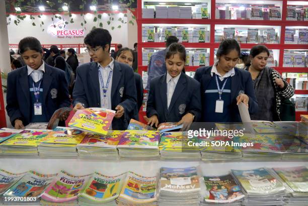 Students visit the book stalls on the first day of the World Book fair 2024 with the theme "MULTI LINGUAL INDIA" A living Tradition, at Pragati...