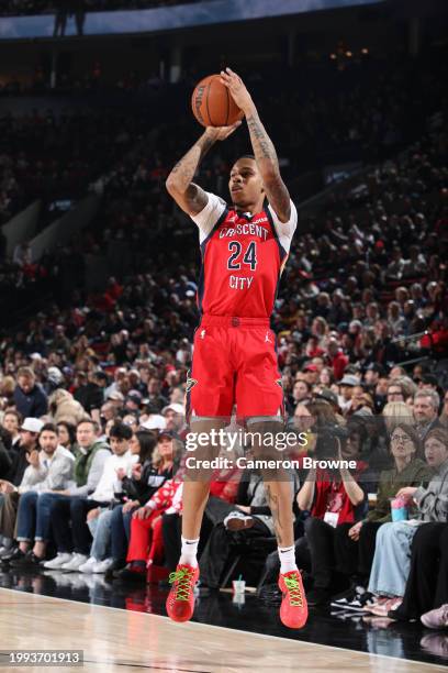 Jordan Hawkins of the New Orleans Pelicans shoots a three point basket during the game against the Portland Trail Blazers on February 10, 2024 at the...