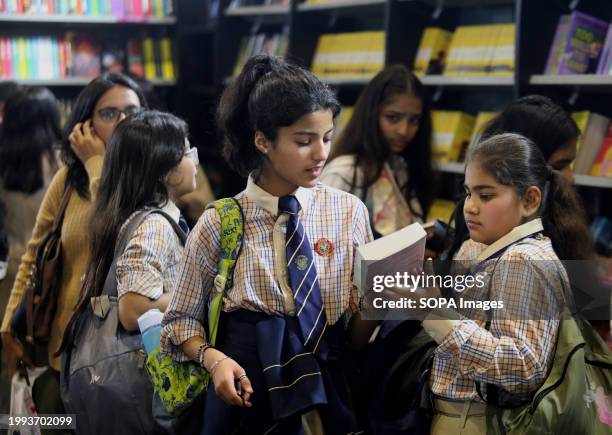Students visit the book stalls on the first day of the World Book fair 2024 with the theme "MULTI LINGUAL INDIA" A living Tradition, at Pragati...