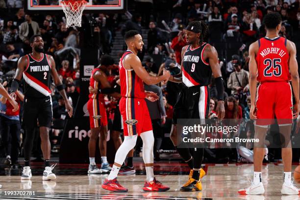 McCollum of the New Orleans Pelicans greets Jerami Grant of the Portland Trail Blazers after the game on February 10, 2024 at the Moda Center Arena...