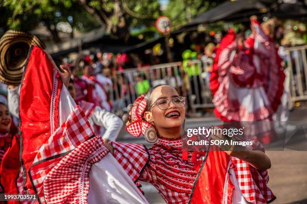 Woman seen dancing during the parade of the Barranquilla carnival. The Barranquilla Carnival is one of the most important folkloric festivals in...