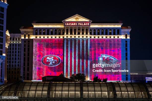 The 49ers and Chiefs logos are projected on the side of Caesars Palace Hotel & Casino leading up to Super Bowl LVIII featuring the NFC Champion San...