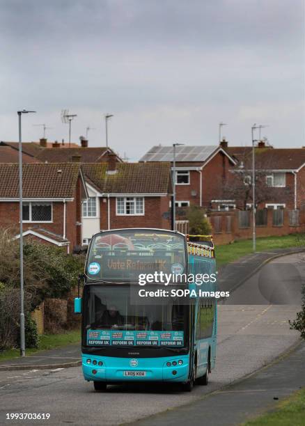 The Reform UK campaign bus drives around the streets of Wellingborough like a giant billboard advertising Ben and the Reform Party. Ben Habib...