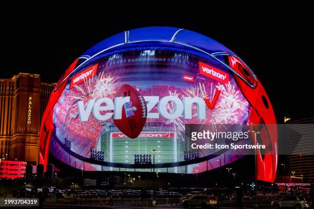 The Sphere displays advertising featuring the Verizon logo with a football leading up to Super Bowl LVIII featuring the NFC Champion San Francisco...