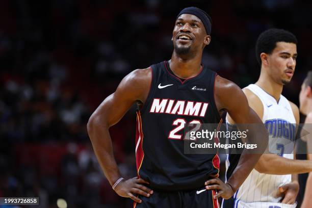 Jimmy Butler of the Miami Heat reacts during the fourth quarter of the game against the Orlando Magic at Kaseya Center on February 06, 2024 in Miami,...