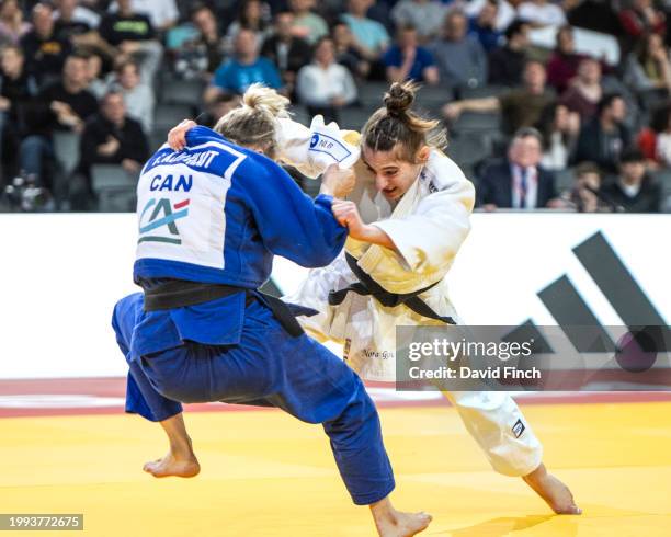 Tokyo Olympic champion, Nora Gjakova of Kosovo attacks Budapest World champion, Jessica Klimkait of Canada knocking her to the mat without a score as...