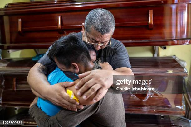 Family members mourn the death of an alleged member of the Tiguerones gang on February 07, 2024 in Guayaquil, Ecuador. The man died while in police...