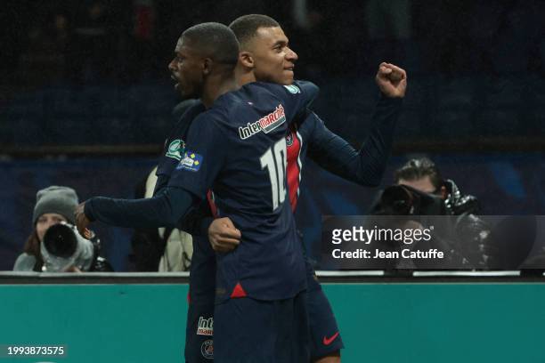 Kylian Mbappe of PSG celebrates his goal with Ousmane Dembele during the French Cup match between Paris Saint-Germain and Stade Brestois 29 at Parc...