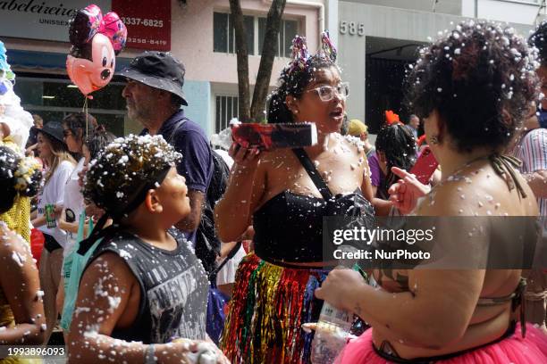 The Bloco das Emilias e Visconde is parading through the streets of the Santa Cecilia neighborhood in Sao Paulo, Brazil, on February 10, 2024.