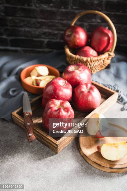 red apples on wooden background - apple tart stock pictures, royalty-free photos & images