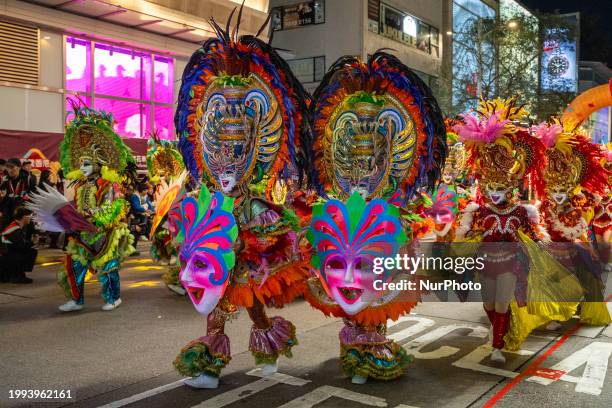 Dancers are dancing in the Lunar New Year Night Parade in Hong Kong, on February 10, 2024. This is the first Lunar New Year Night Parade since the...