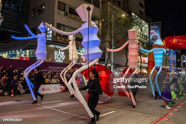 Performer is participating in the Lunar New Year Night Parade in Hong Kong, on February 10, 2024. This is the first Lunar New Year Night Parade since...