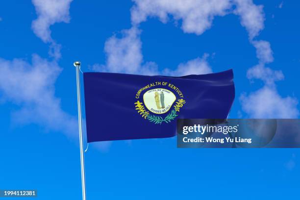 kentucky state flag with blue sky background . us state flag 3d rendered - kentucky stock pictures, royalty-free photos & images