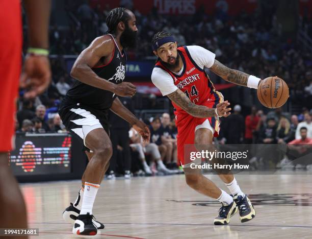 Brandon Ingram of the New Orleans Pelicans drives to the basket on James Harden of the LA Clippers during the first half at Crypto.com Arena on...