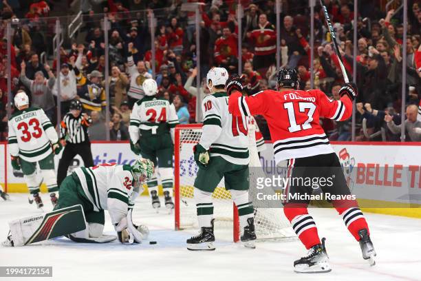 Nick Foligno of the Chicago Blackhawks celebrates after scoring a goal past Filip Gustavsson of the Minnesota Wild during the second period at the...