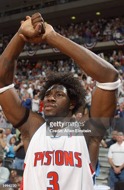 Ben Wallace of the Detroit Pistons displays a "lock down" gesture after the victory over the Orlando Magic in Game seven of the Eastern Conference...
