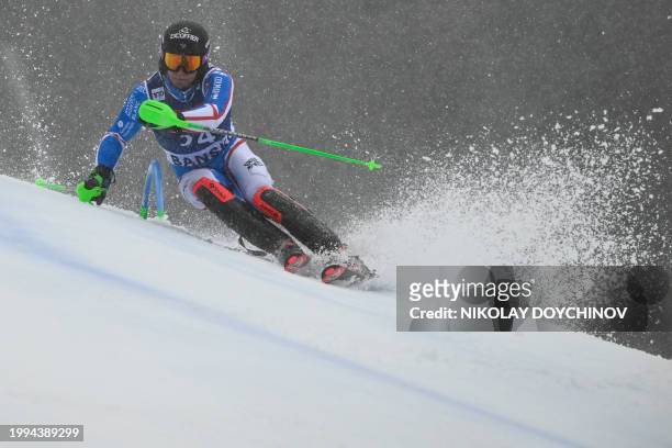 France's Steven Amiez competes in the Men's Slalom event during the FIS Alpine Ski World Cup in Bansko, on February 11, 2024.