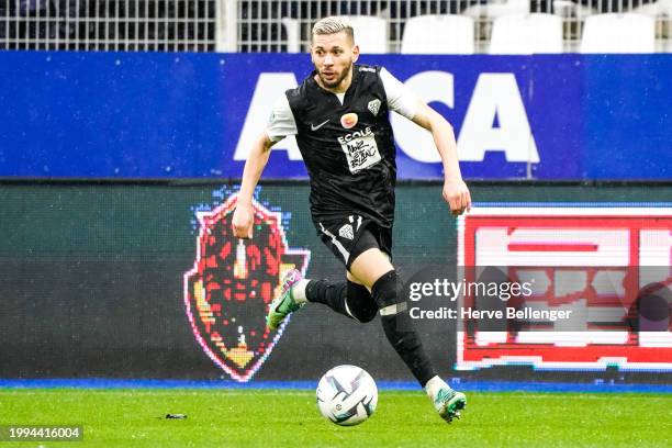 Farid EL MELALI of SCO Angers Rayan RAVELOSON of AJ Auxerre during the Ligue 2 BKT match between Association de la Jeunesse Auxerroise and Angers...