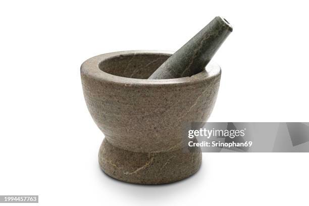 from ancient roots to modern kitchens: stone mortar and pestle in culinary artistry - mortaio con pestello foto e immagini stock