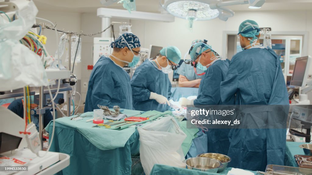Group of surgeons began heart surgery