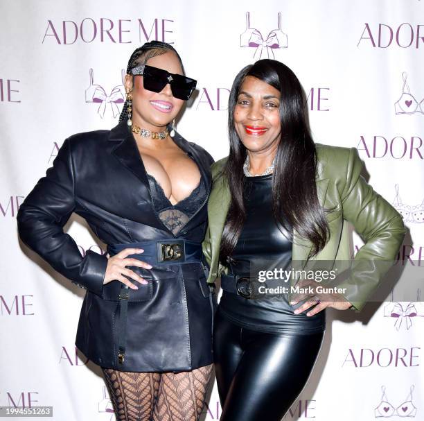 Singer Ashanti and Mother Tina Douglas pose backstage after she performed during the Adore Me fashion show at New York Fashion Week Fall 2024 powered...