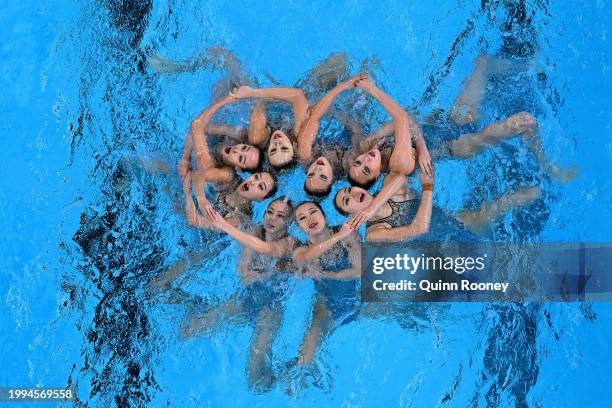 Hao Chang, Ciyue Wang, Wentao Cheng, Binxuan Xiang, Yu Feng, Yanning Xiao, Xiuchen Li and Yayi Zhang of Team China compete in the Mixed Team Free...