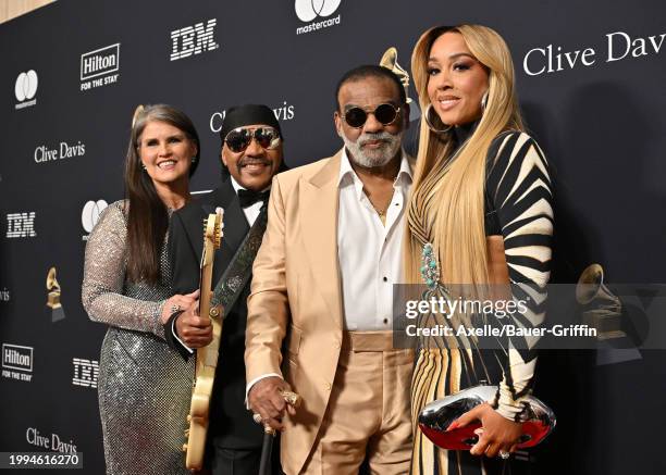 Tracy Isley, Ernie Isley and Ronald Isley of the Isley Brothers, and Kandy Johnson Isley attend the 66th GRAMMY Awards Pre-GRAMMY Gala & GRAMMY...