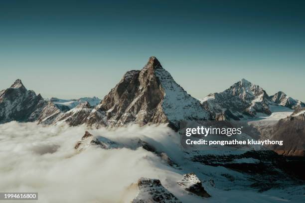 matterhorn mountain winter view in zermatt / switzerland european alps - vetta foto e immagini stock