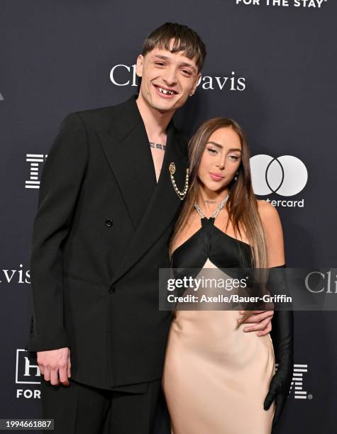 Peso Pluma and Nicki Nicole attends the 66th GRAMMY Awards Pre-GRAMMY Gala & GRAMMY Salute To Industry Icons Honoring Jon Platt at The Beverly Hilton...