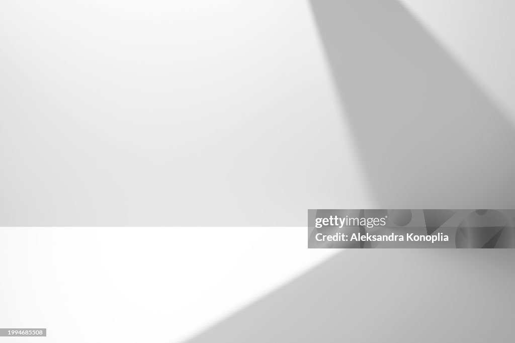 Minimal empty black and white 3d room background with natural architectural shadows. Modern sunny Studio showcase with window light reflections. Front view, copy space.