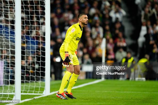 Paulo Gazzaniga goalkeeper of Girona and Argentina during the LaLiga EA Sports match between Real Madrid CF and Girona FC at Estadio Santiago...