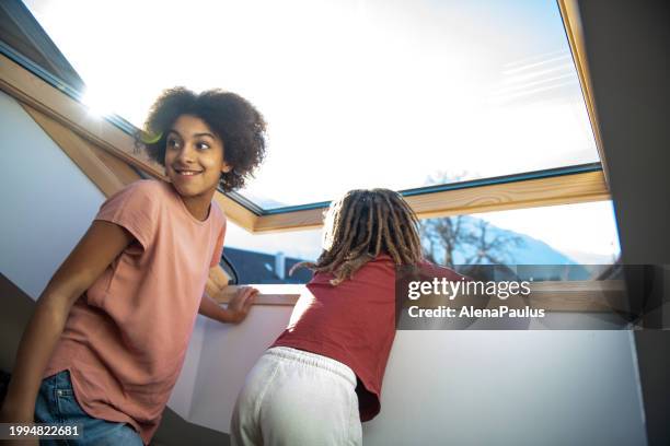 children look through the large skylight - skylight stock pictures, royalty-free photos & images
