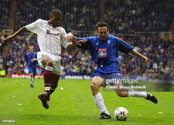 Glen Johnson of West Ham United closes down Stan Lazaridis of Birmingham City during the FA Barclaycard Premiership match between Birmingham City and...