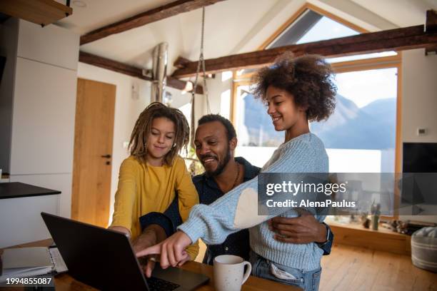 content creator working at home with kids around - content creation stock pictures, royalty-free photos & images